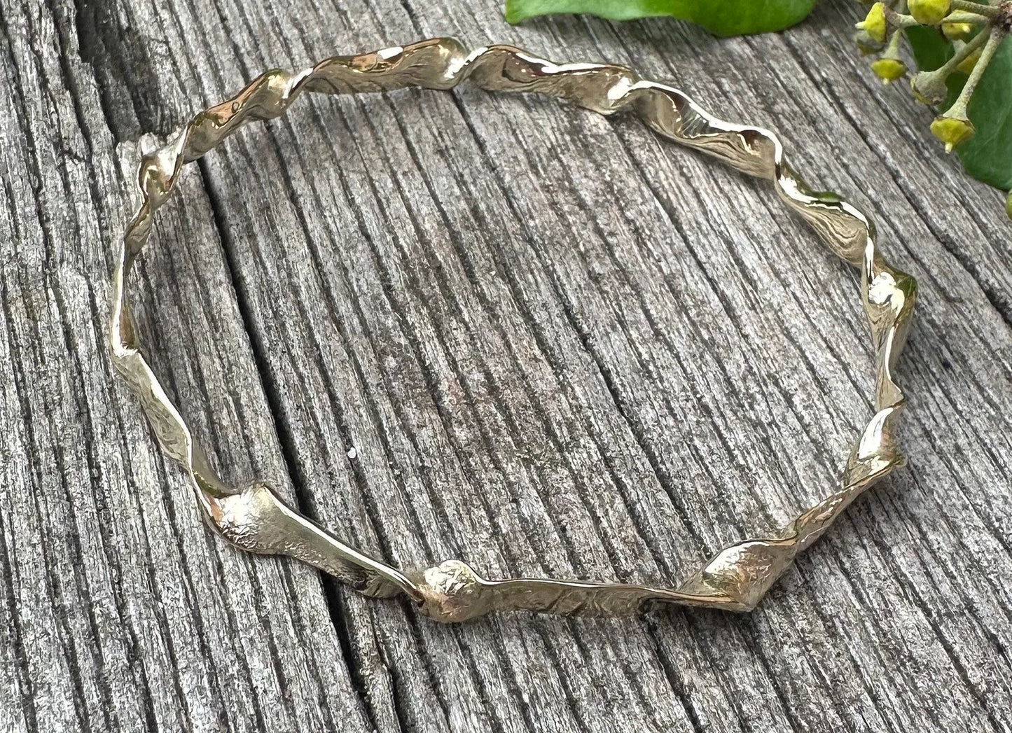 Elegant handcrafted solid silver bangle